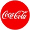 Coca-Cola logo in red script on white, representing the global beverage brand